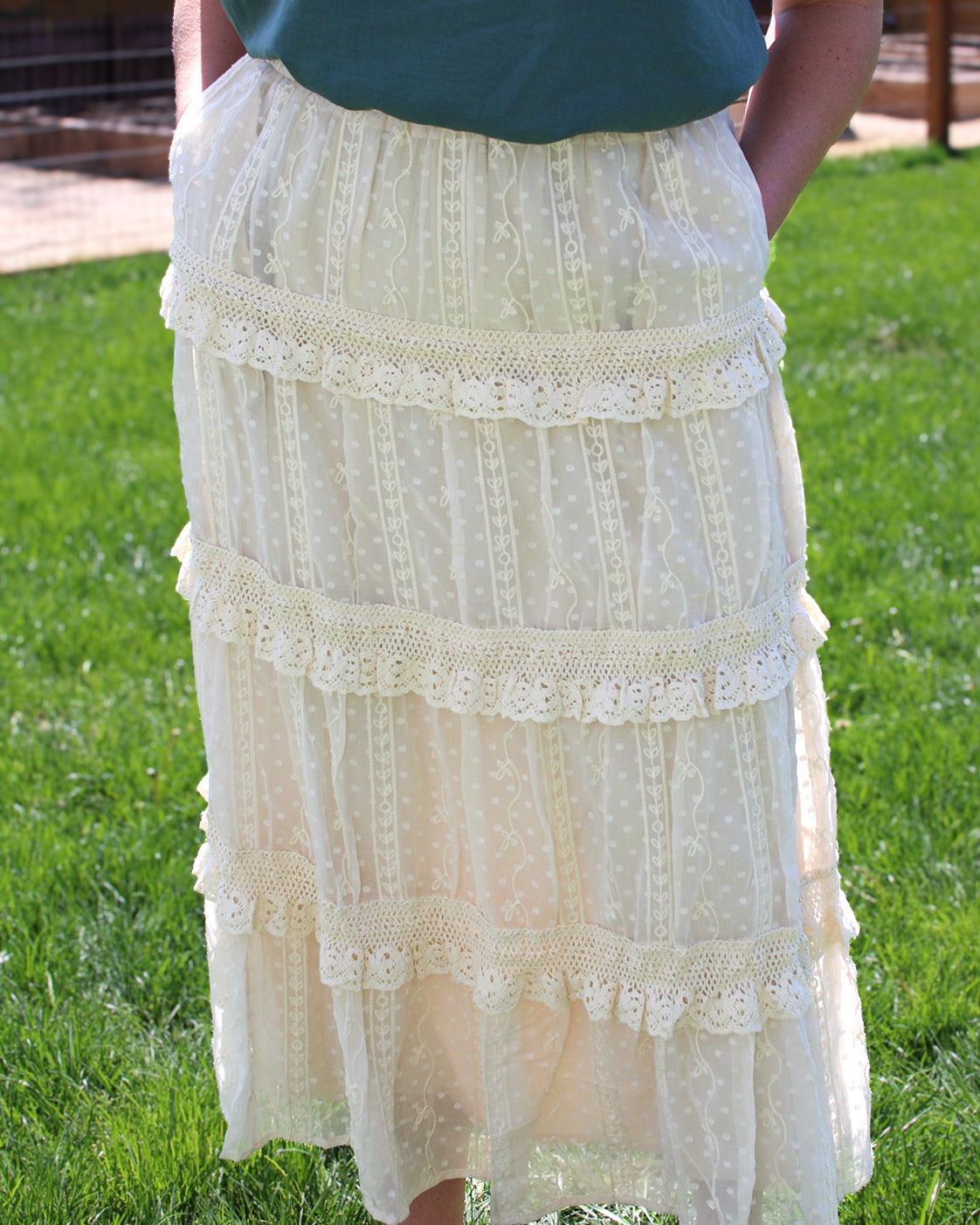     Ivory lace midi skirt with pockets and feminine details