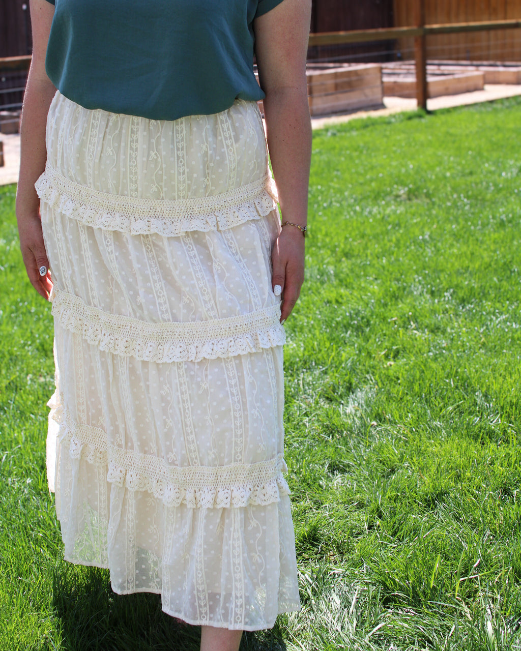 Ivory lace midi skirt with pockets and feminine details