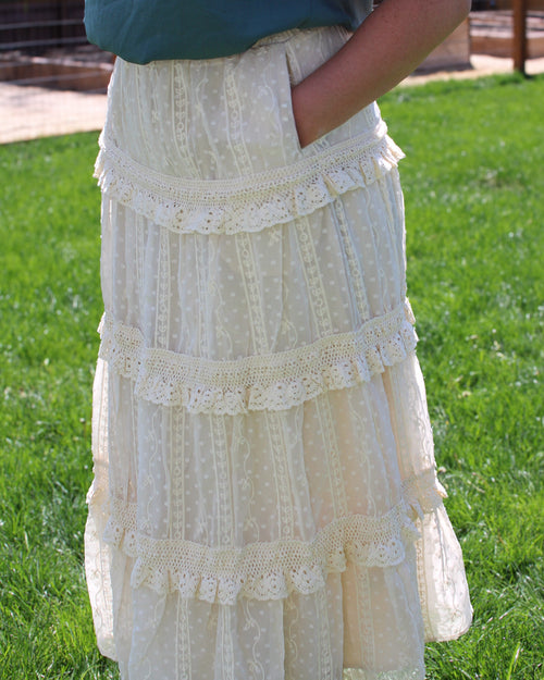 Ivory lace midi skirt with pockets and feminine details