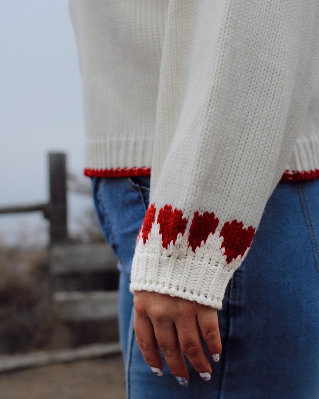 Soft knit cream and red accented heart sweater