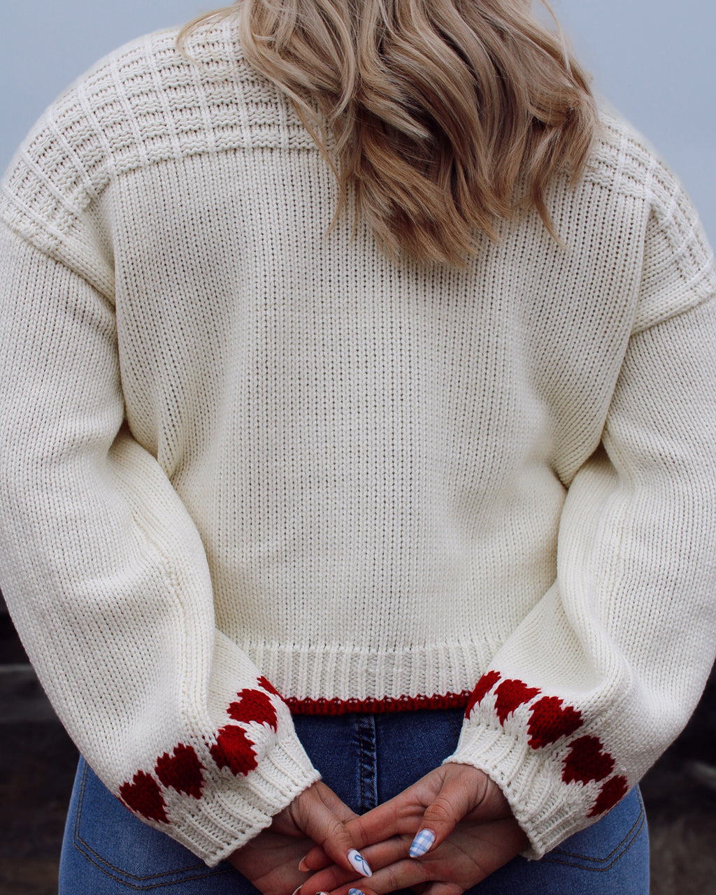 Soft knit cream and red accented heart sweater