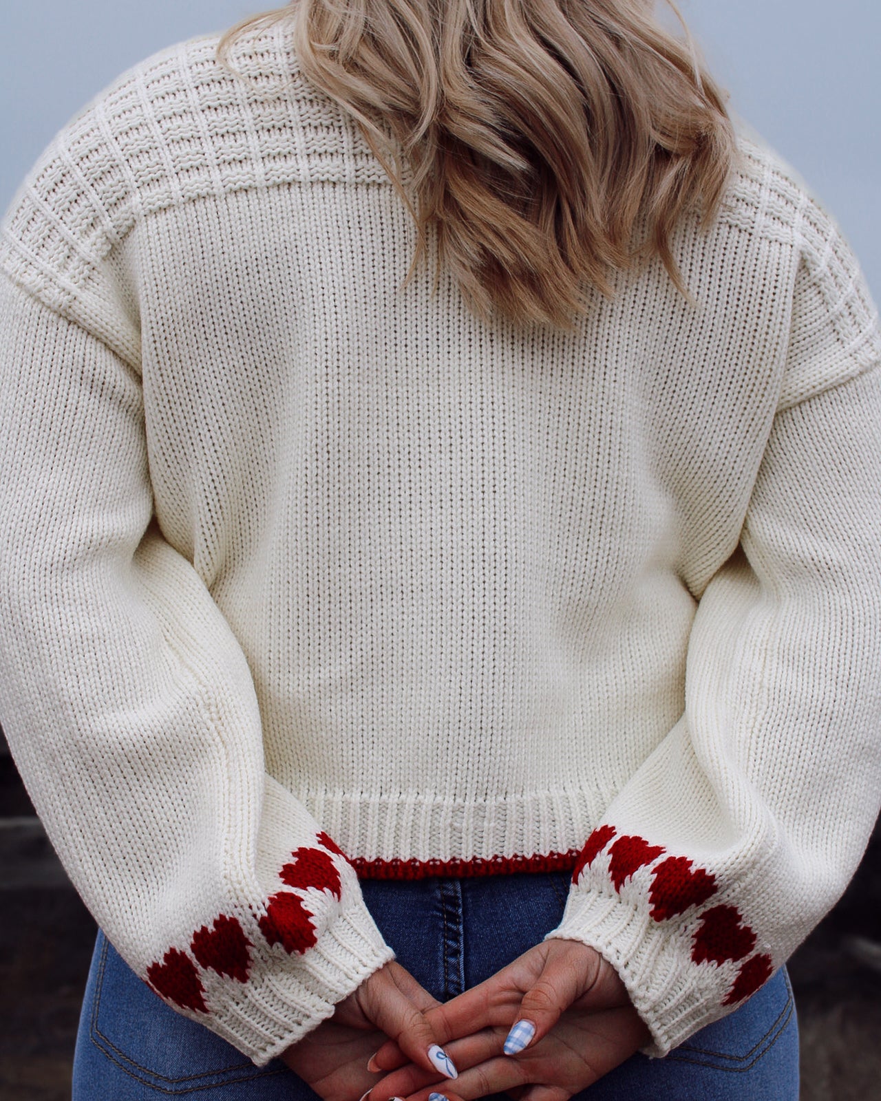 Soft knit cream and red accented heart sweater