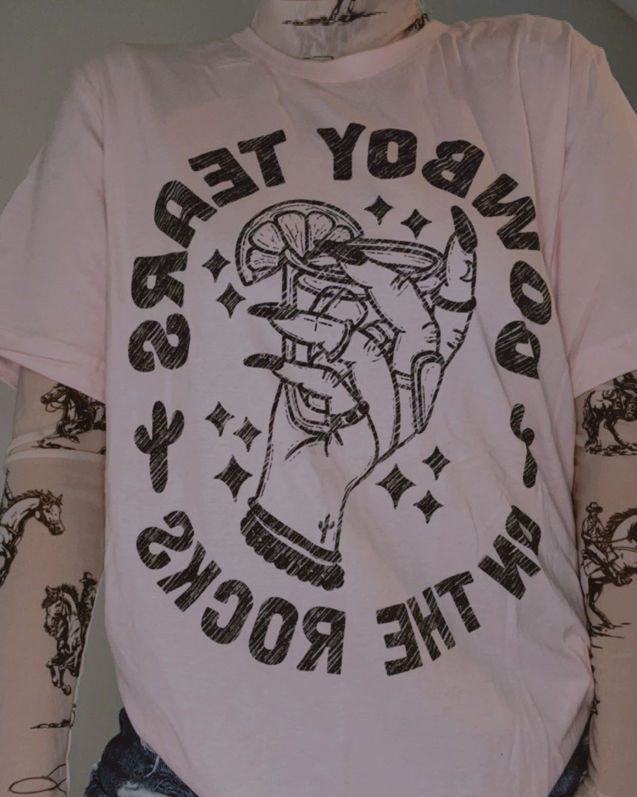 Pink cowboy tears on the rocks western graphic t-shirt for women